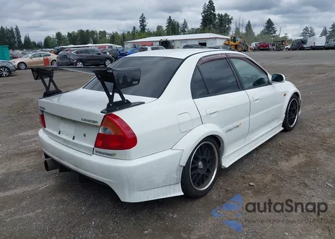 1998 Mitsubishi Lancer z USA, uszkodzony, nr VIN CP9A0003723